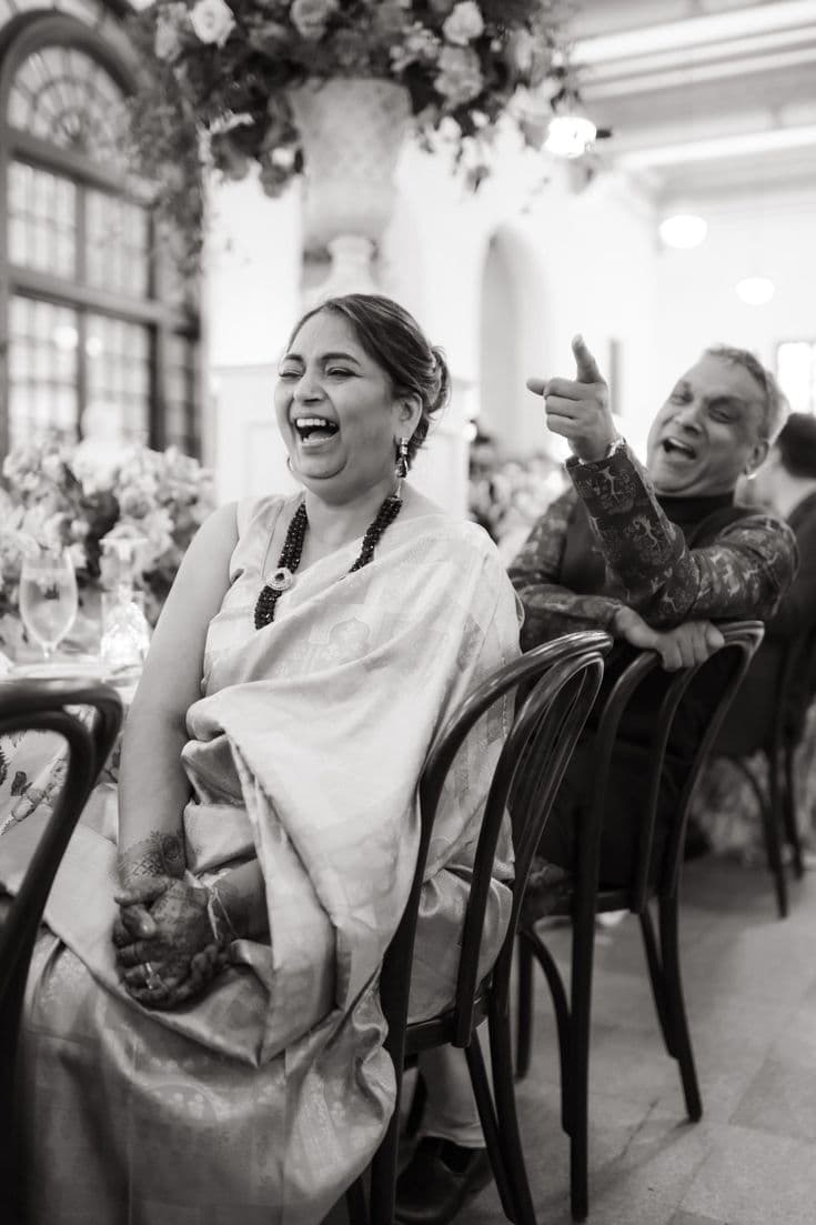 candid laughter at intimate Indian wedding