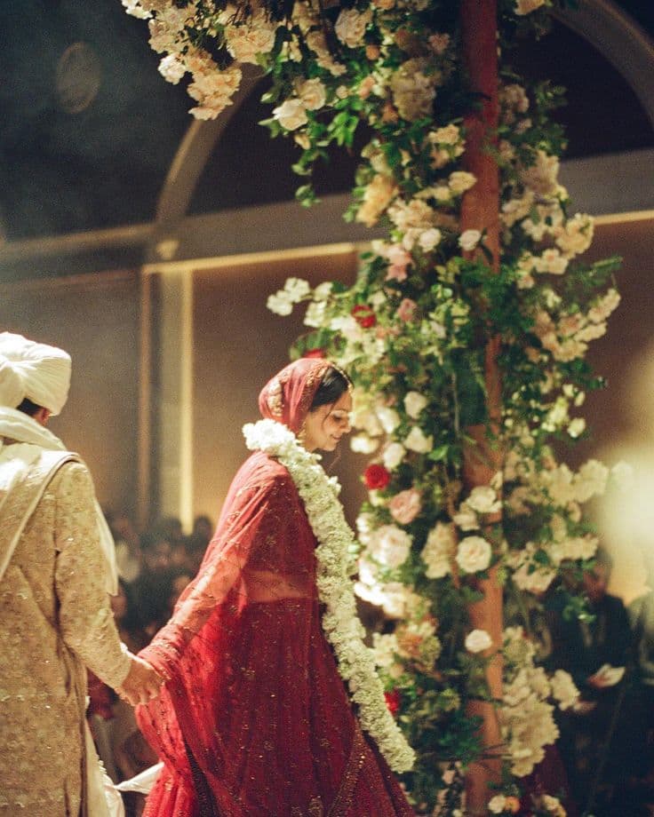 Hindu wedding ceremony bride with floral mandap